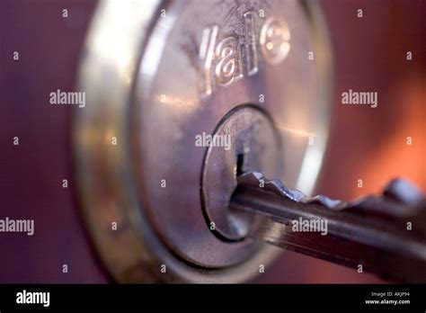 Unlocking Locking Front Door Yale Key In Lock Stock Photo Alamy